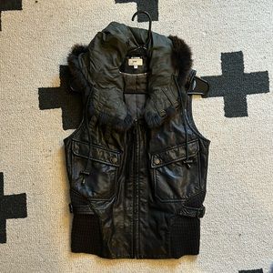 Brown leather vest with fur trim hood